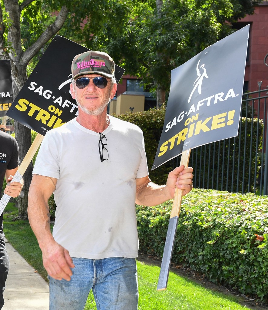 Sean Penn walks a picket line of the Writers Guild of America and the Screen Actors Guild outside of Disney Studios in Burbank, California, on Aug. 1. 