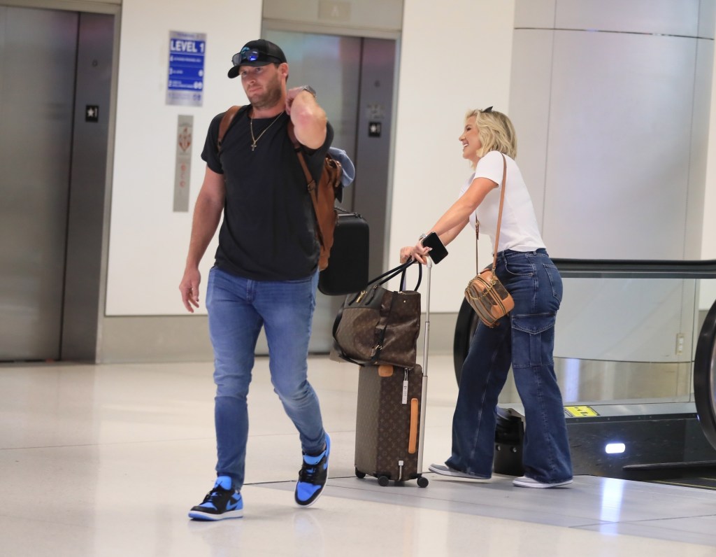 Savannah Chrisley was all smiles with Robert Shiver at LAX on Sept. 6.
