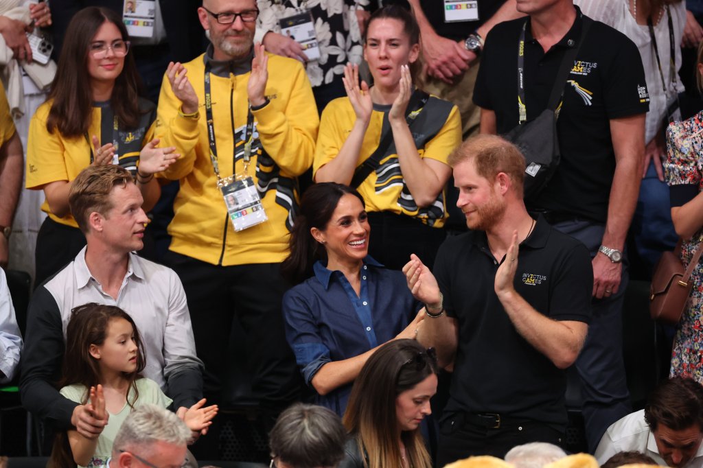 Prince Harry and Meghan Markle, the Duke and Duchess of Sussex, on their third day together at the Invictus Games in Dusseldorf, Germany. 