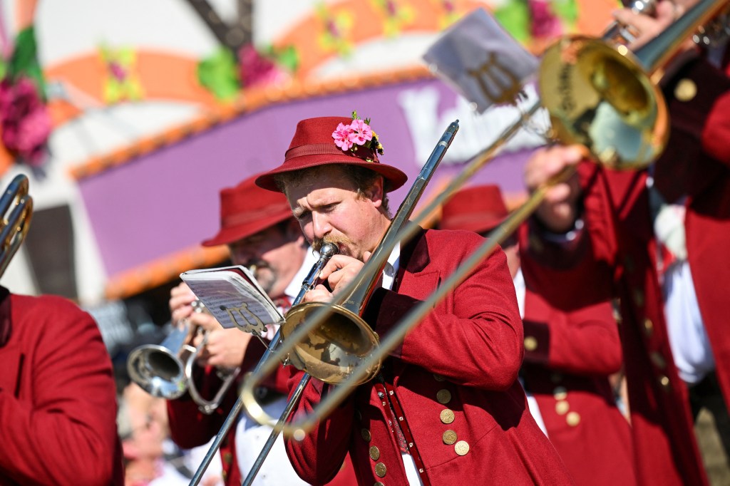 People dressed in historical clothes attend the parade during the official opening of the 188th Oktoberfest.