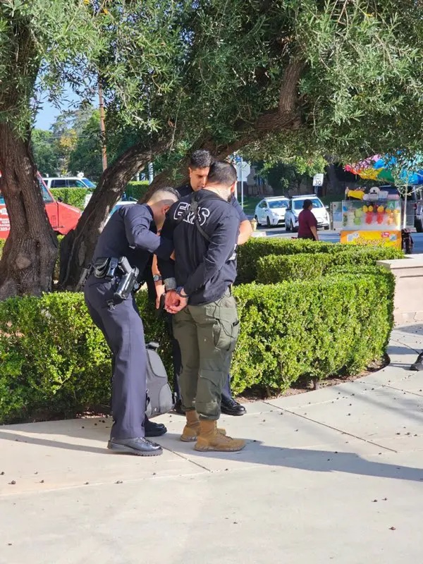 Photo shows the man being arrested