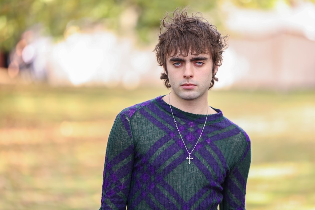 Lennon Gallagher looking at the camera. 