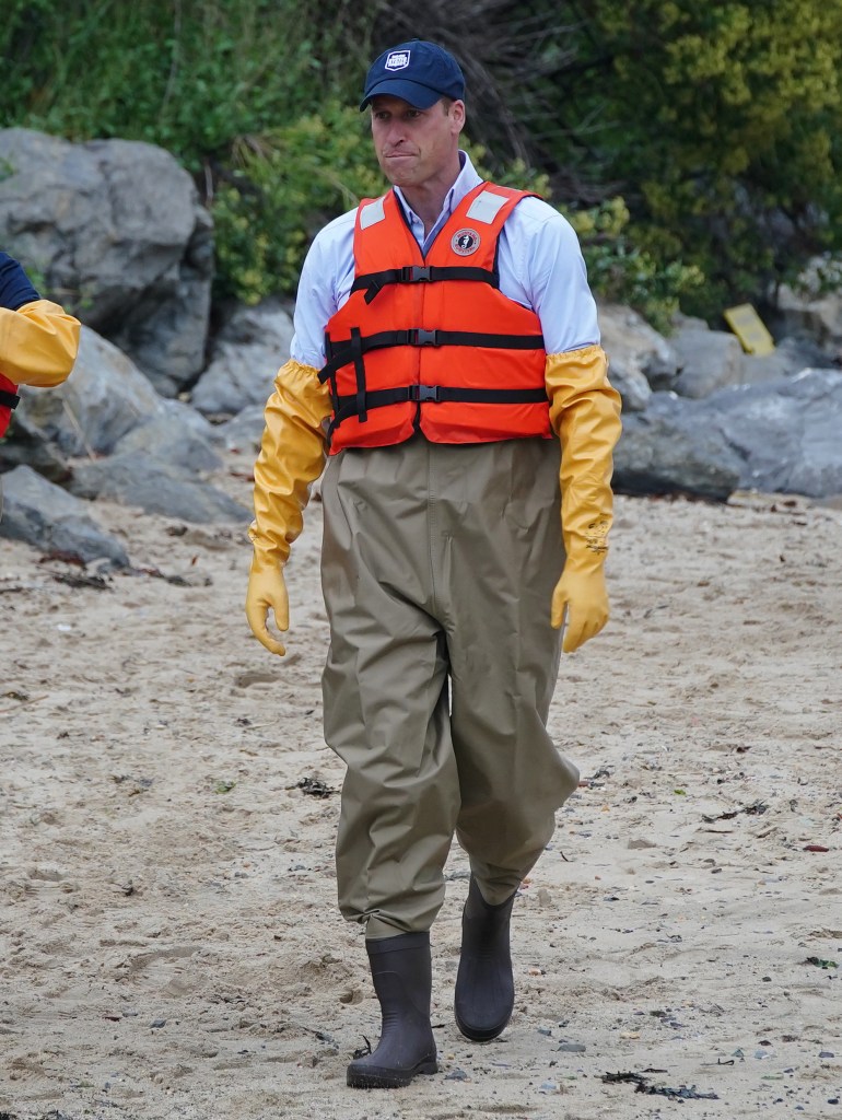 Photo of Prince William in waders. 