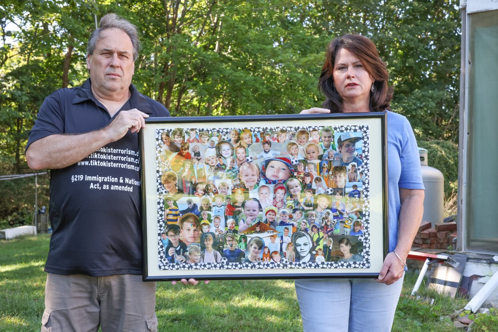 Michael and Shonell Green holding a framed collage of photos of their late son, Tate. 