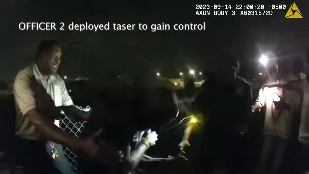 The officers inform Mims that it's time to pack up and go while he repeatedly tells them to "Get out of my face" while the band plays loudly, according to the clip. 