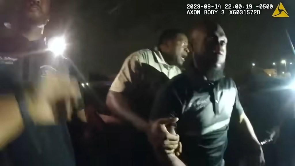 One of the cops tells him to put his hands behind his back and then tased him when he refused -- as 140 students looked on and screamed, the video shows. 