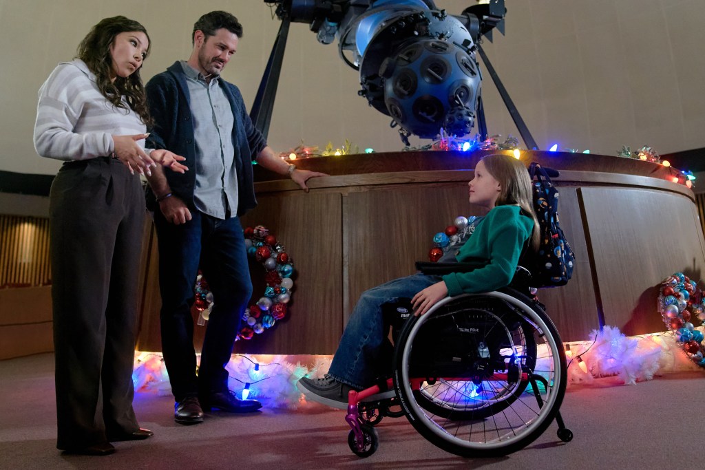 Jessica Parker Kennedy, Ryan Paevey and Emmy Richardson in "Under The Christmas Sky." 