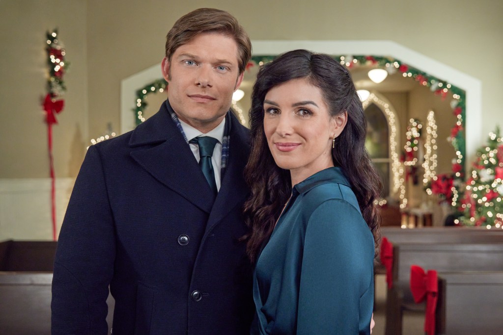 Chris Carmack and Shenae Grimes-Beech in "Time for Her To Come Home for Christmas." 