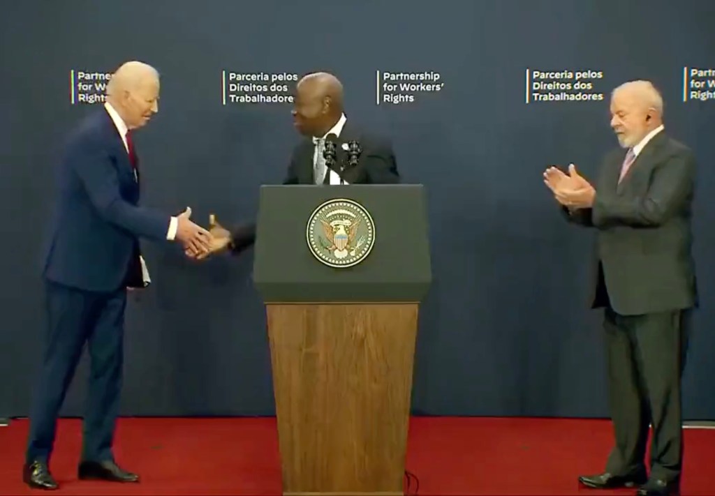 President Joe Biden is seen shaking hands with International Labor Organization Director General Gilbert Huongbo following a joint speech with Brazil’s Luiz Inácio Lula da Silva on Wednesday.