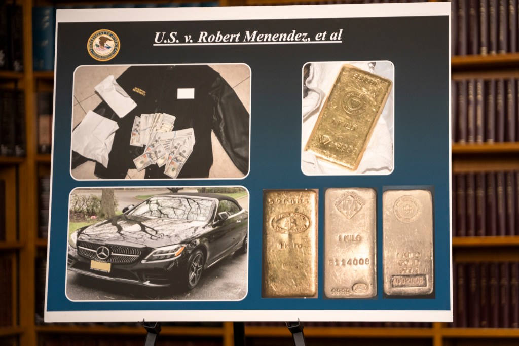 A Mercedes C-class, gold bars, and piles of cash allegedly given to Menendez in bribes and found in his home by agents 