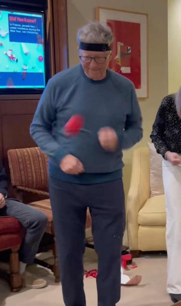 Bill Gates playing with a toy