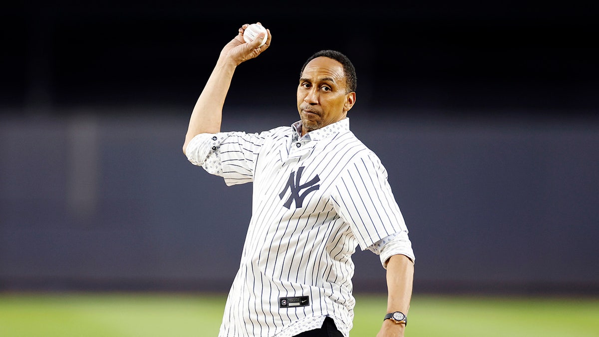 Stephen A. Smith throws ball