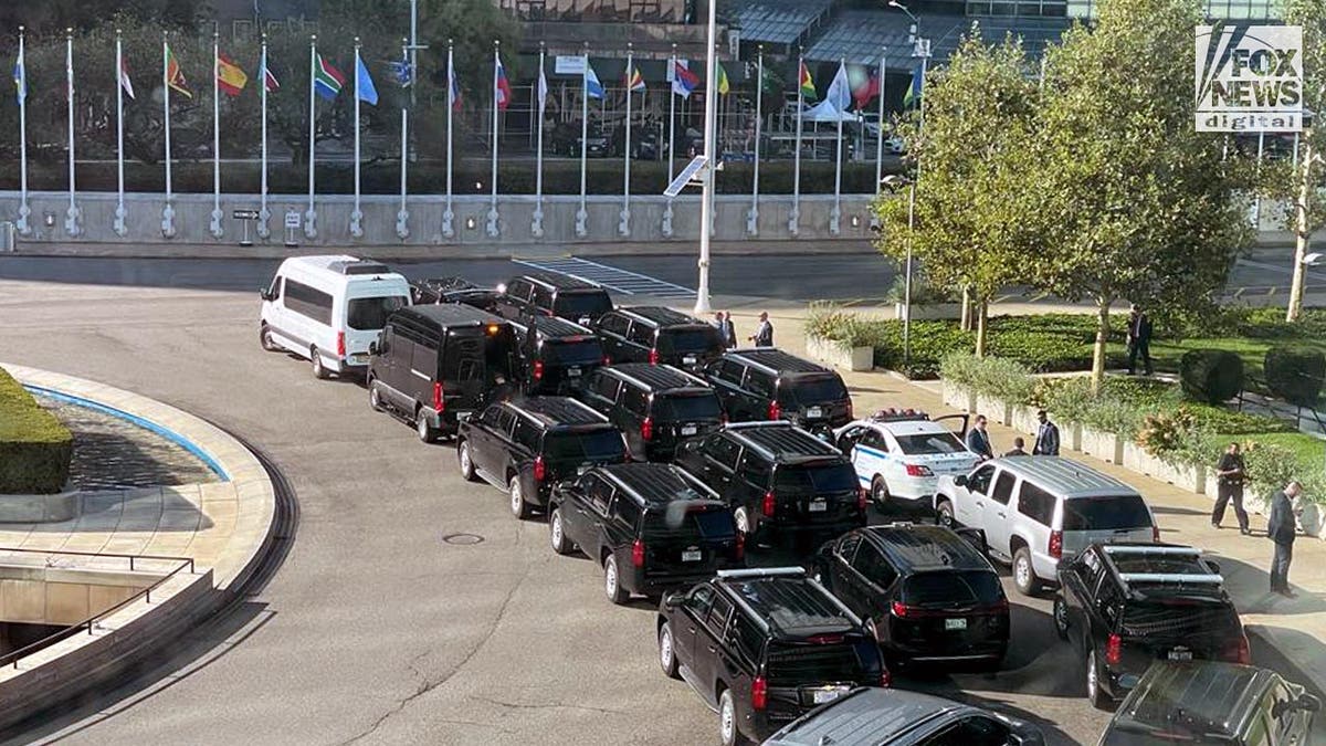 Cars lined up deeply in the traffic circle at the United Nations