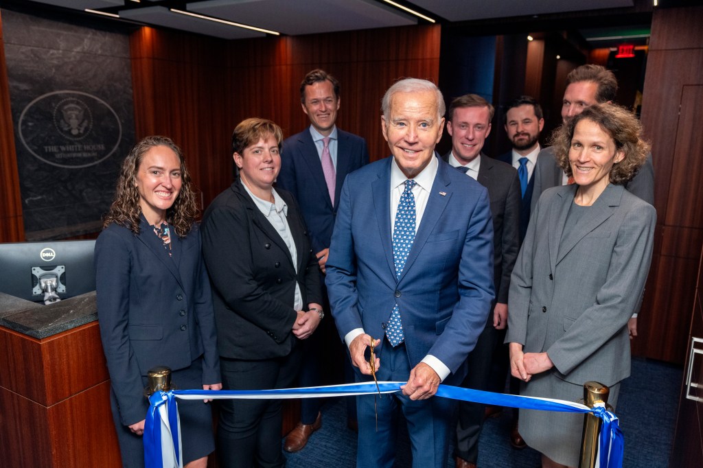 In this image provided by the White House, President Joe Biden stands in the reception area as he attends a ribbon cutting for the renovated White House Situation Room, Sept. 5, 2023, in the West Wing of the White House in Washington.The 5,500-square-foot, highly secure complex of conference rooms and offices in the West Wing has undergone a gut renovation that took a year to complete.