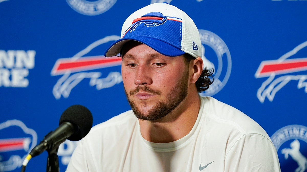 Josh Allen talks to reporters