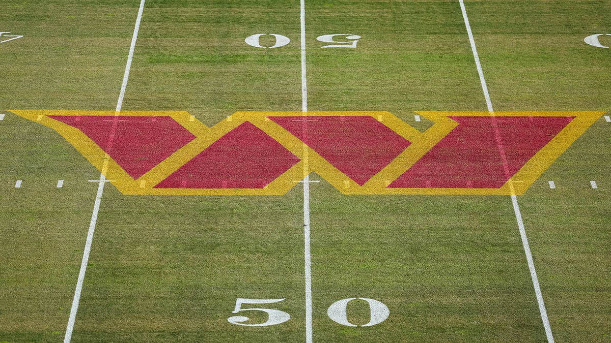 Commanders logo on field