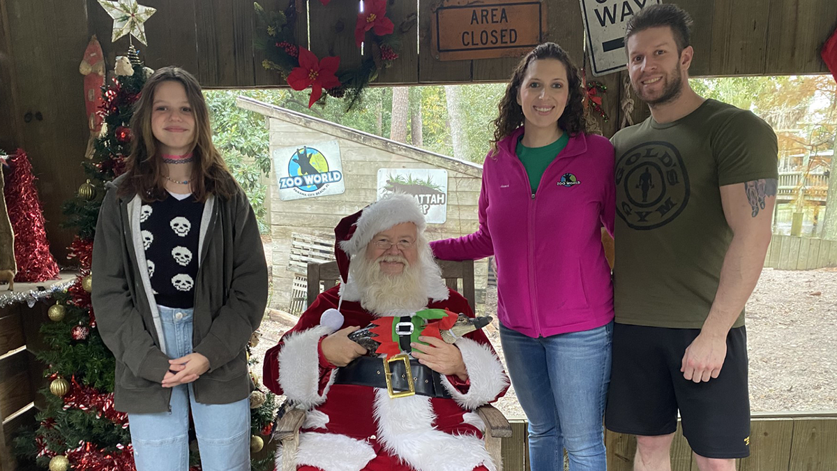 Davis family with Santa at Christmas