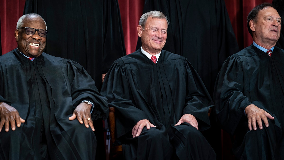 Supreme Court justices Brett Kavanaugh, John Roberts and Samuel Alito