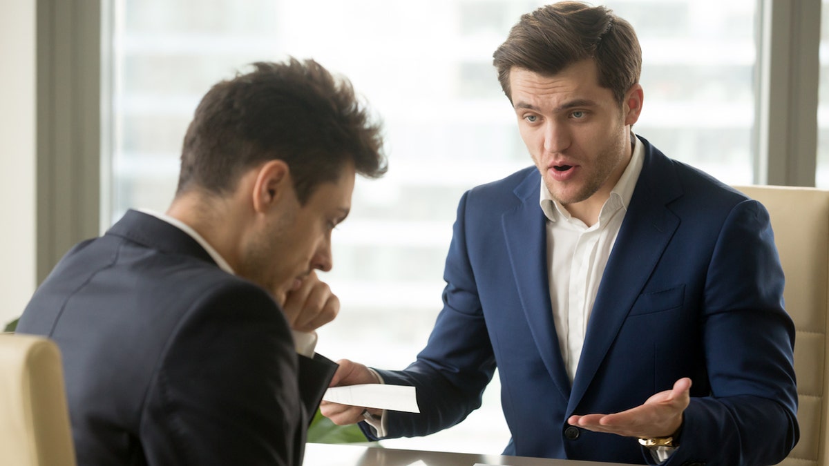 Boss yelling at employee