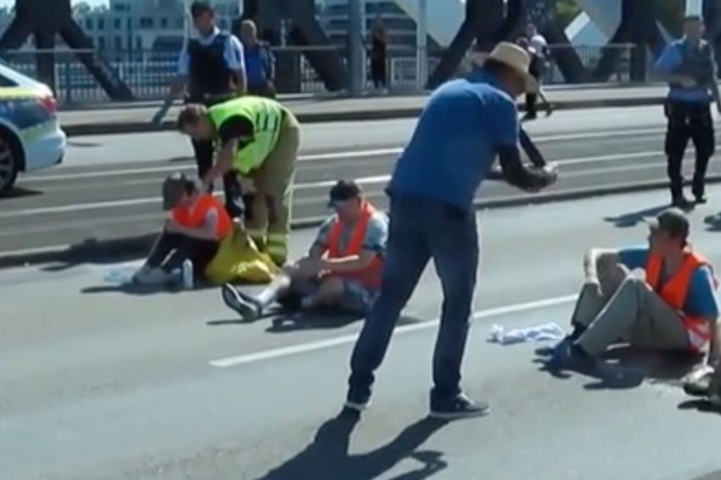 The alleged oil was supposed to be used to  separate the activists' hands from the pavement.