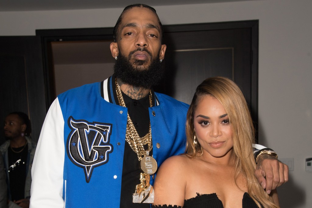 WEST HOLLYWOOD, CA - FEBRUARY 16:  (L-R) Nipsey Hussle and Lauren London attend Nipsey Hussle's Private Debut Album Release Party at The London West Hollywood at Beverly Hills on February 16, 2018 in West Hollywood, California.  (Photo by Earl Gibson III/Getty Images)