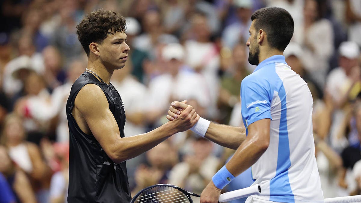 Ben Shelton and Novak Djokovic shake hands