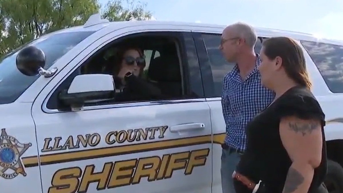 Goldsteins talking to sheriff's deputy