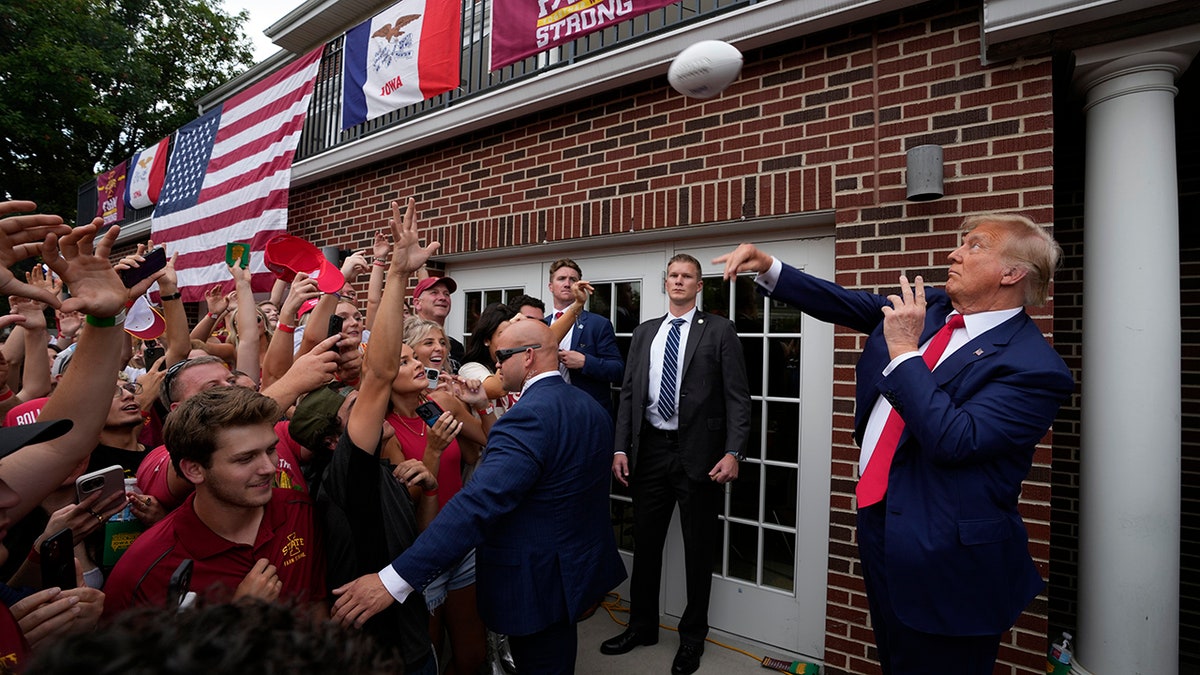 Trump throwing football