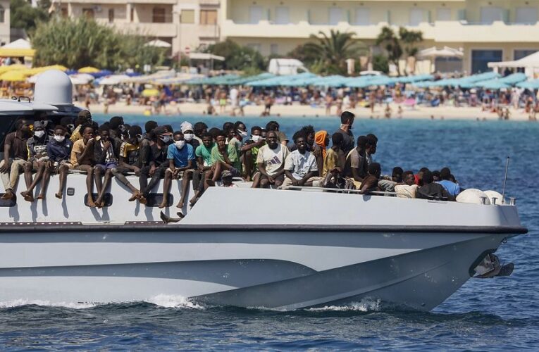 EU countries agree new rules to deal with future migration crises after Italy compromises