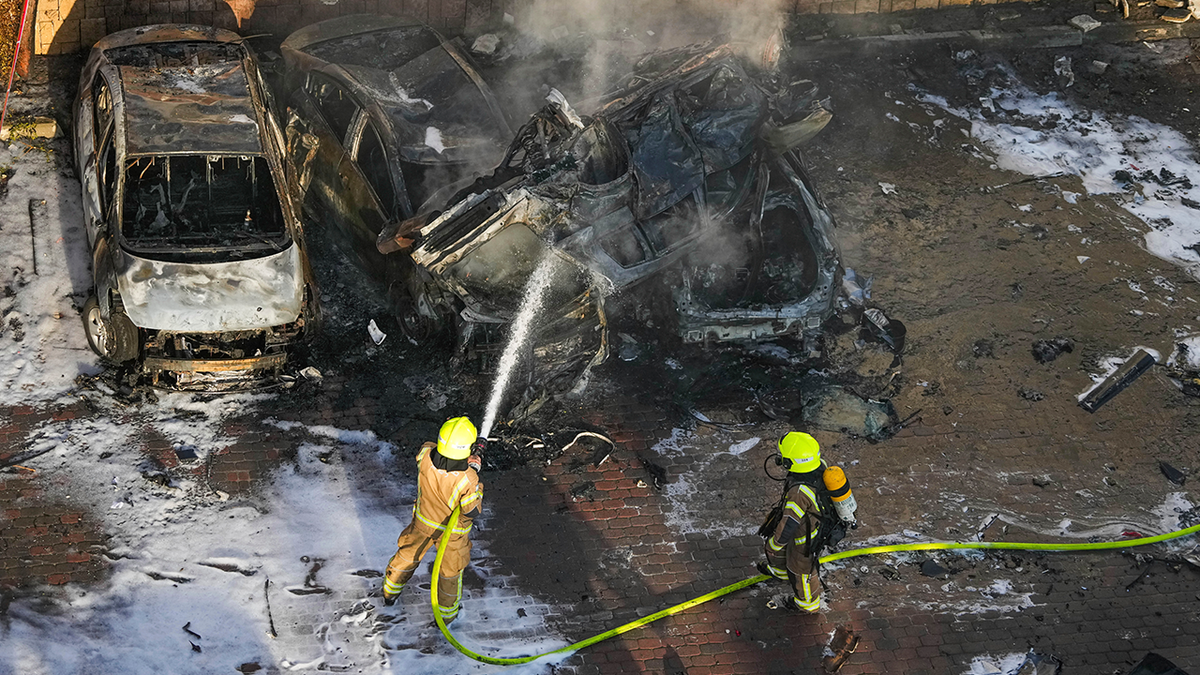 Israeli firefighters extinguish fire