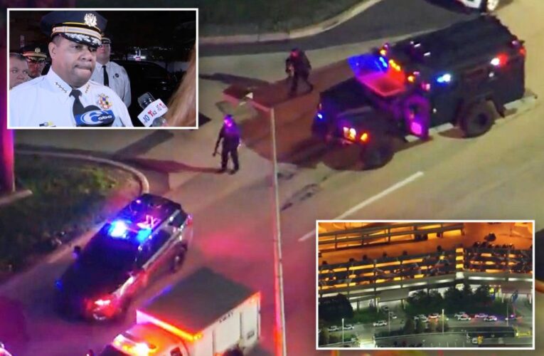 Philadephia police officer shot and killed inside airport garage during car robbery