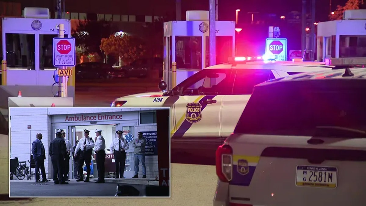 Philadelphia Police Officers and cars at a crime scene