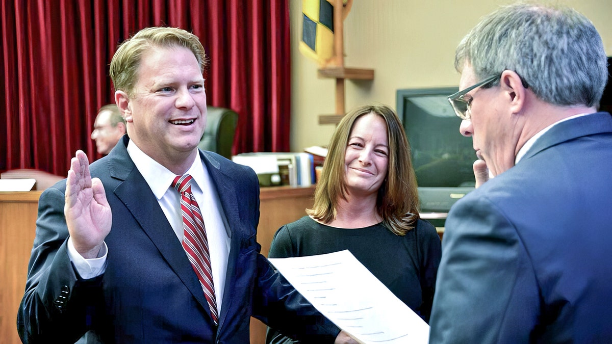 Judge Andrew Wilkinson being sworn in