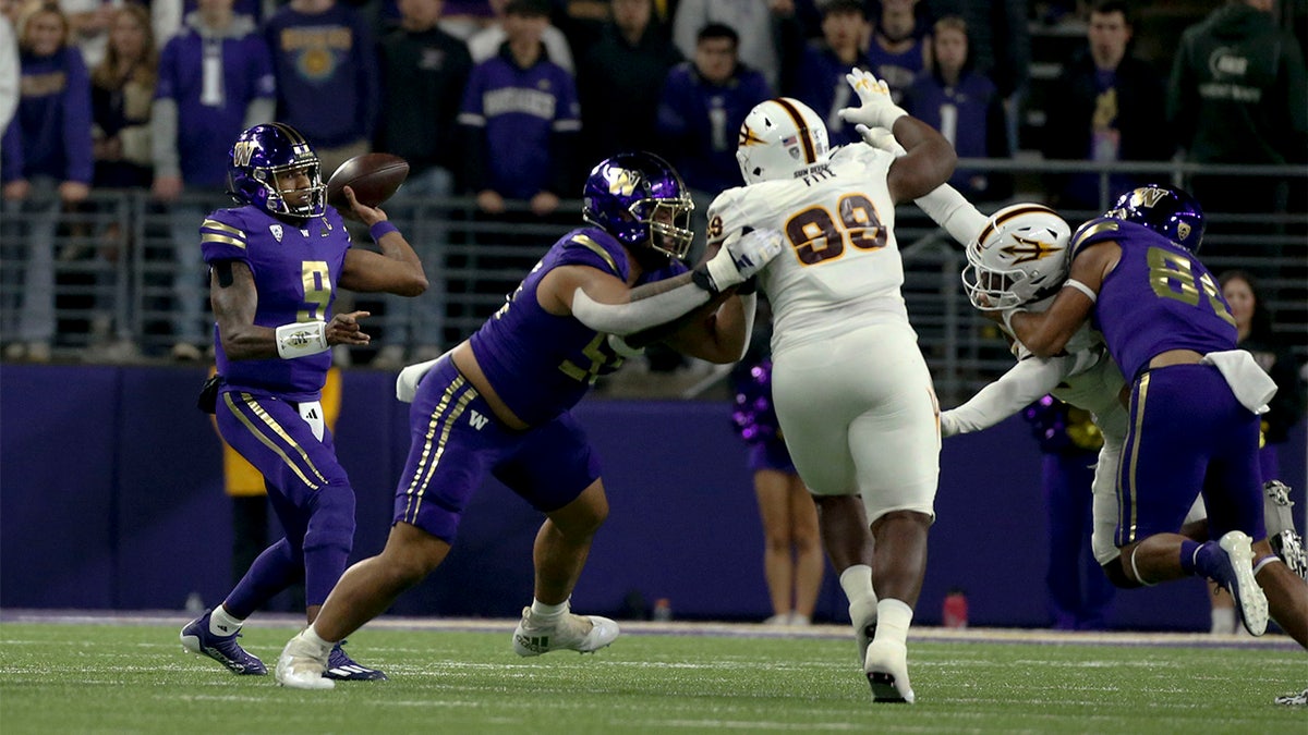 Michael Penix Jr. throws against ASU