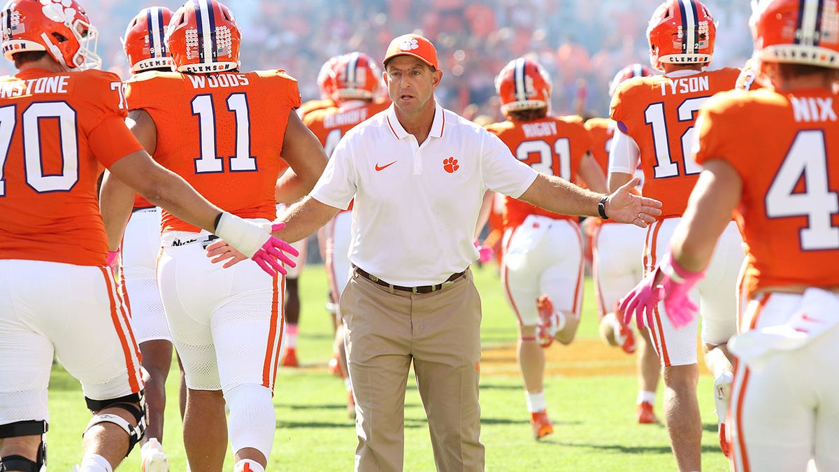 Dabo Swinney shakes hands