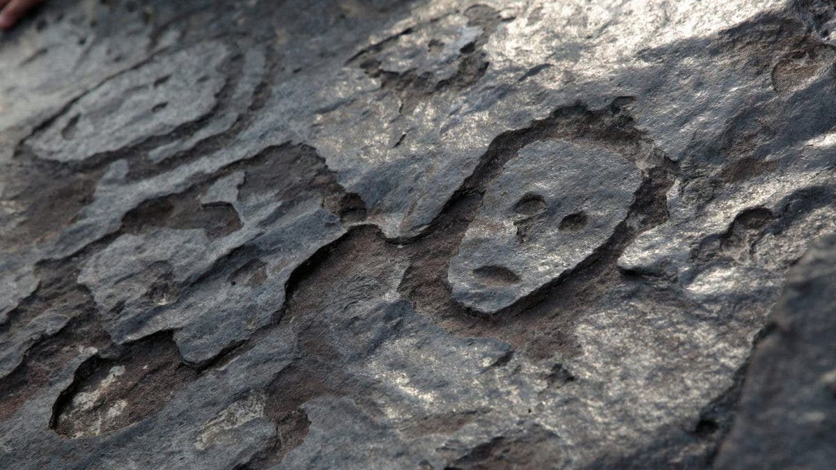 Brazil human face carvings Manaus, Amazonas