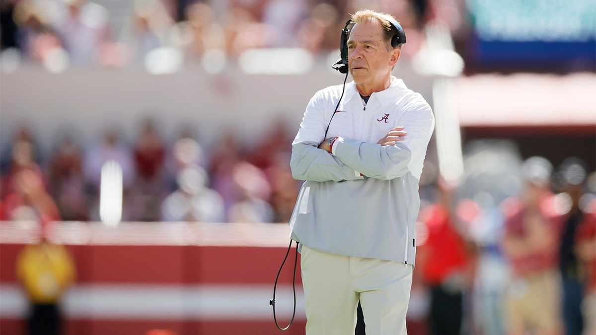 Nick Saban looks on against Arkansas