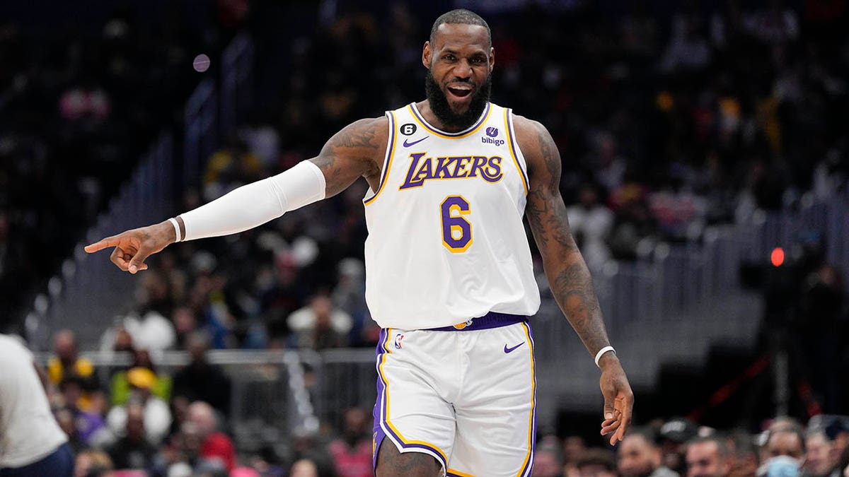 LeBron James reacts after scoring during a game