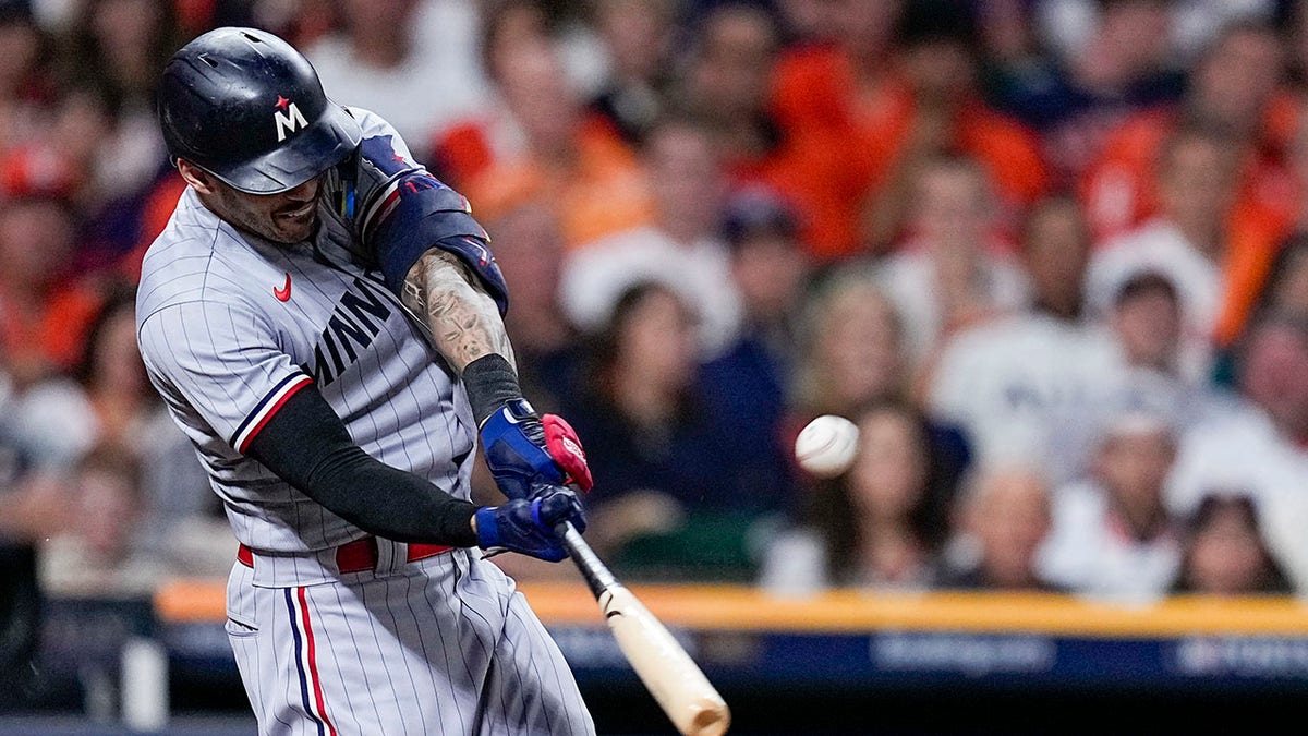 Carlos Correa swings