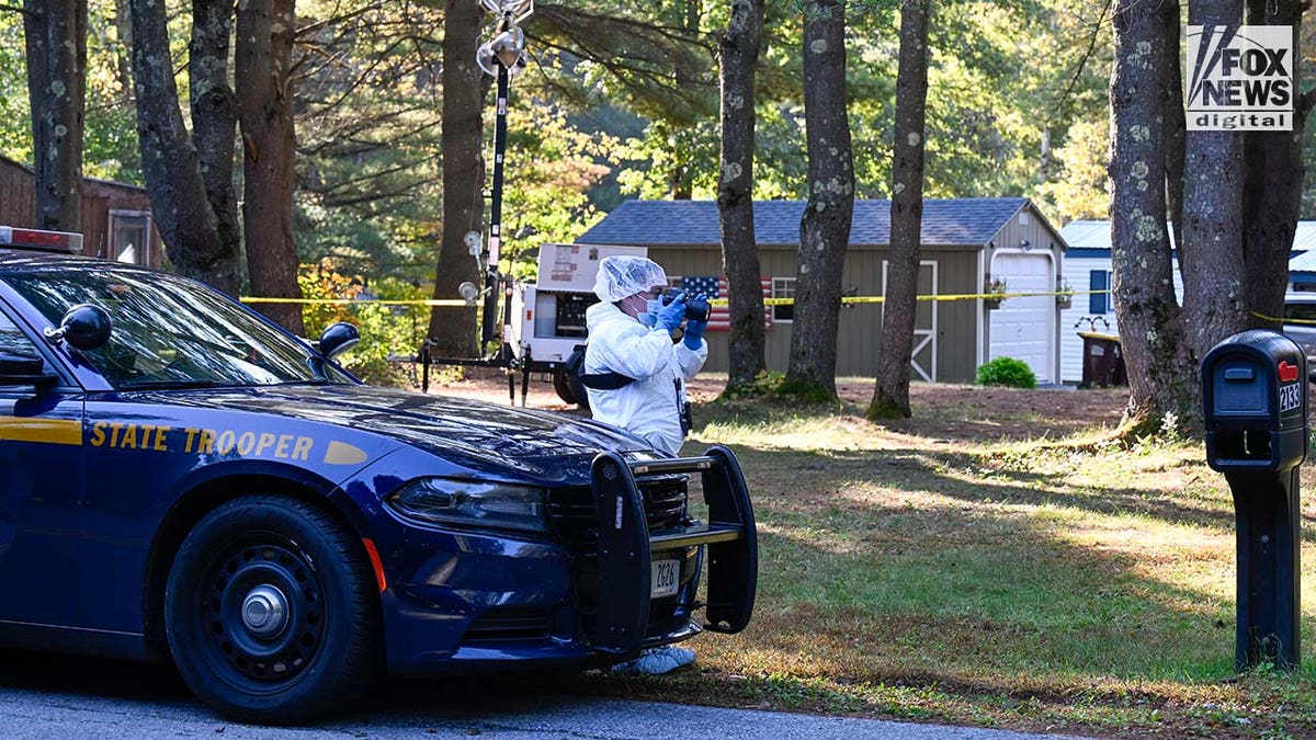 New York State Police collect evidence at the home of Craig Ross Jr.