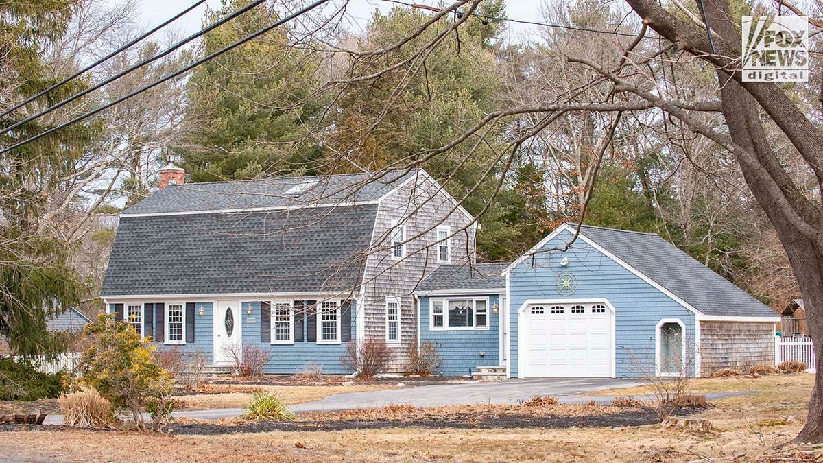 Lindsay Clancy's blue, two story house.