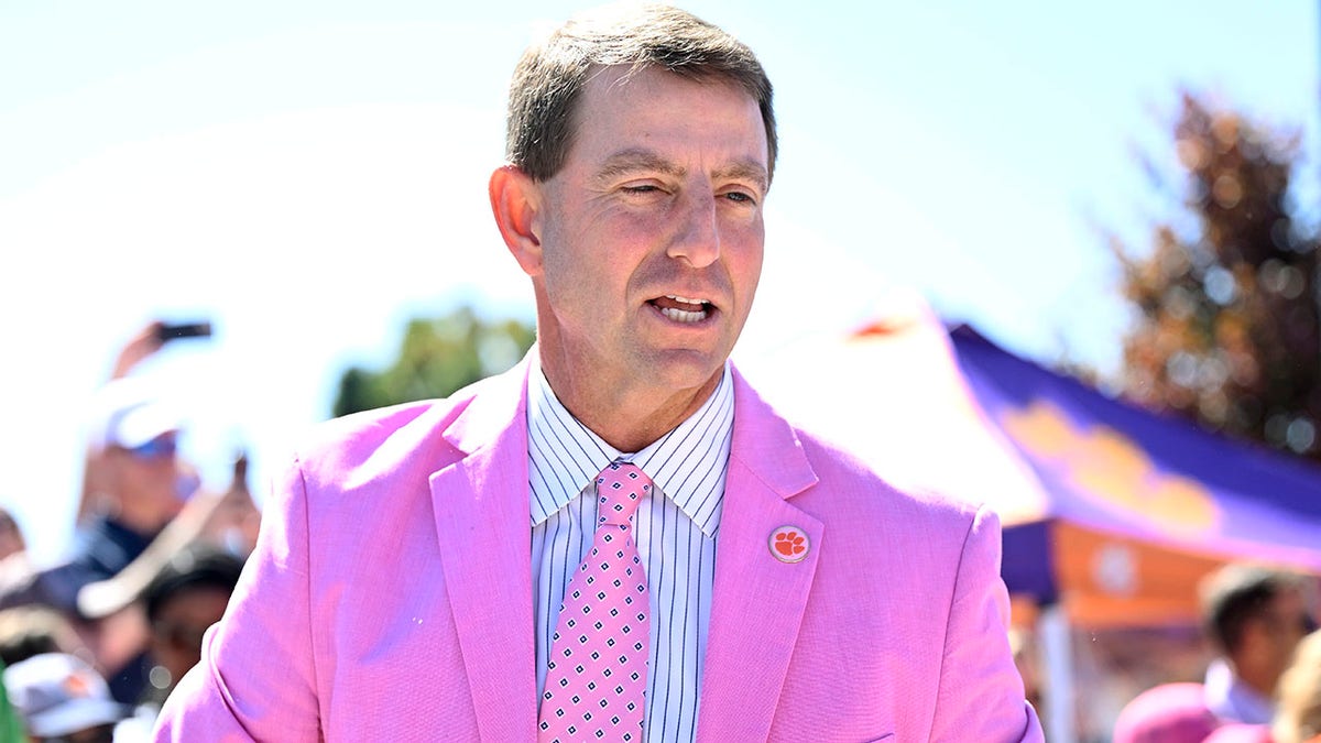 Dabo Swinney walks