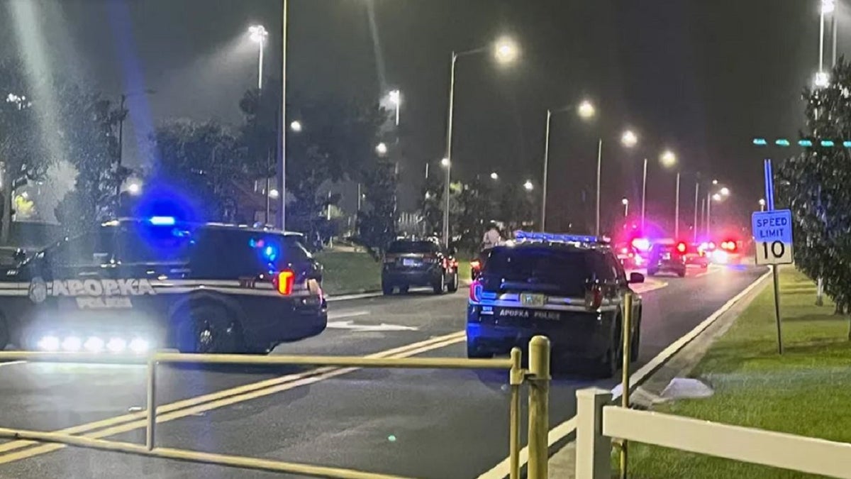 Apopka police at the scene where two juveniles were shot at a Pop Warner football practice