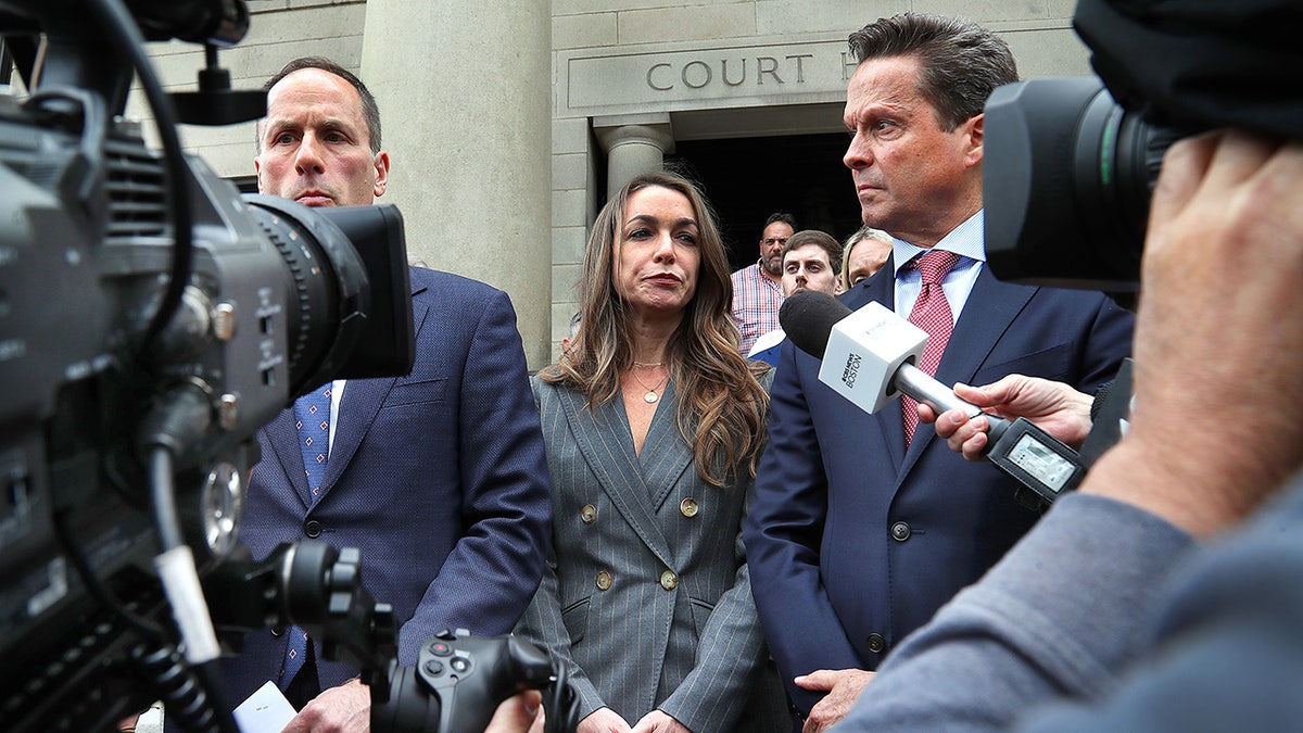 Karen Read outside court with reporters