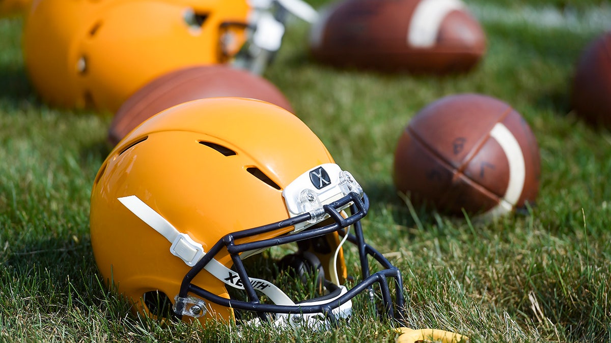 football helmets on the ground