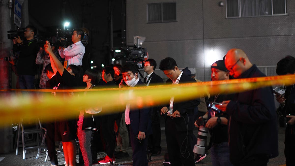 Japanese journalists await update