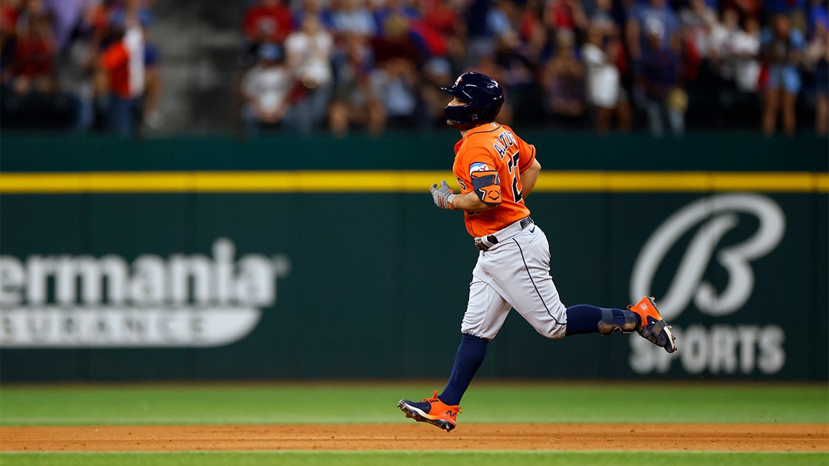 Jose Altuve rounds the bases