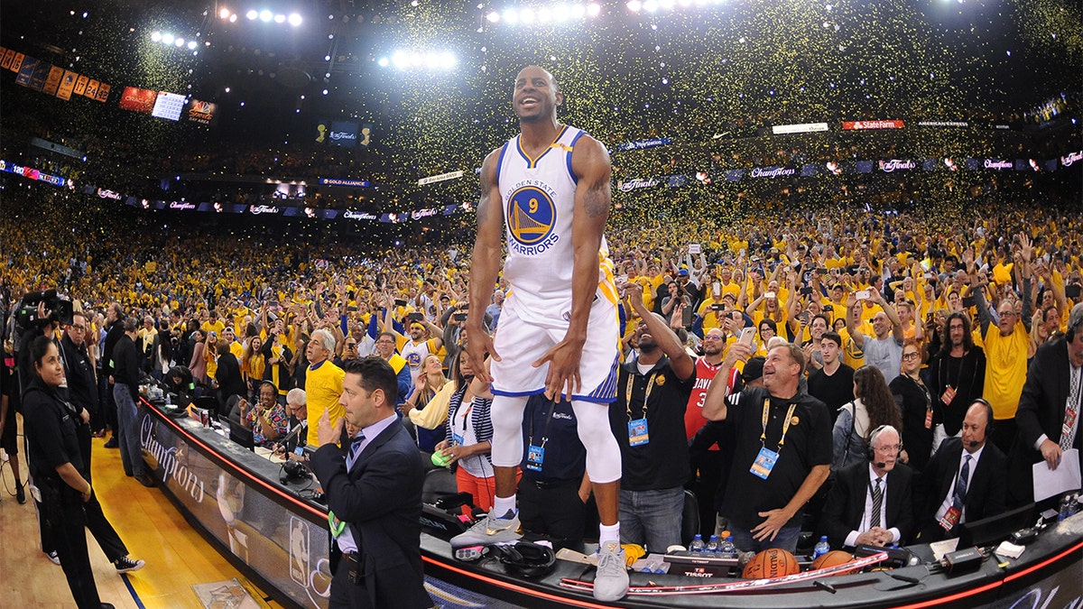 Andre Iguodala celebrates a championship