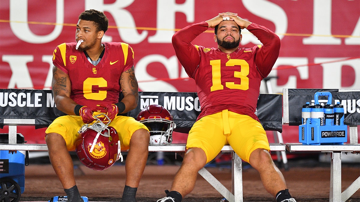 Caleb Williams sits on the bench