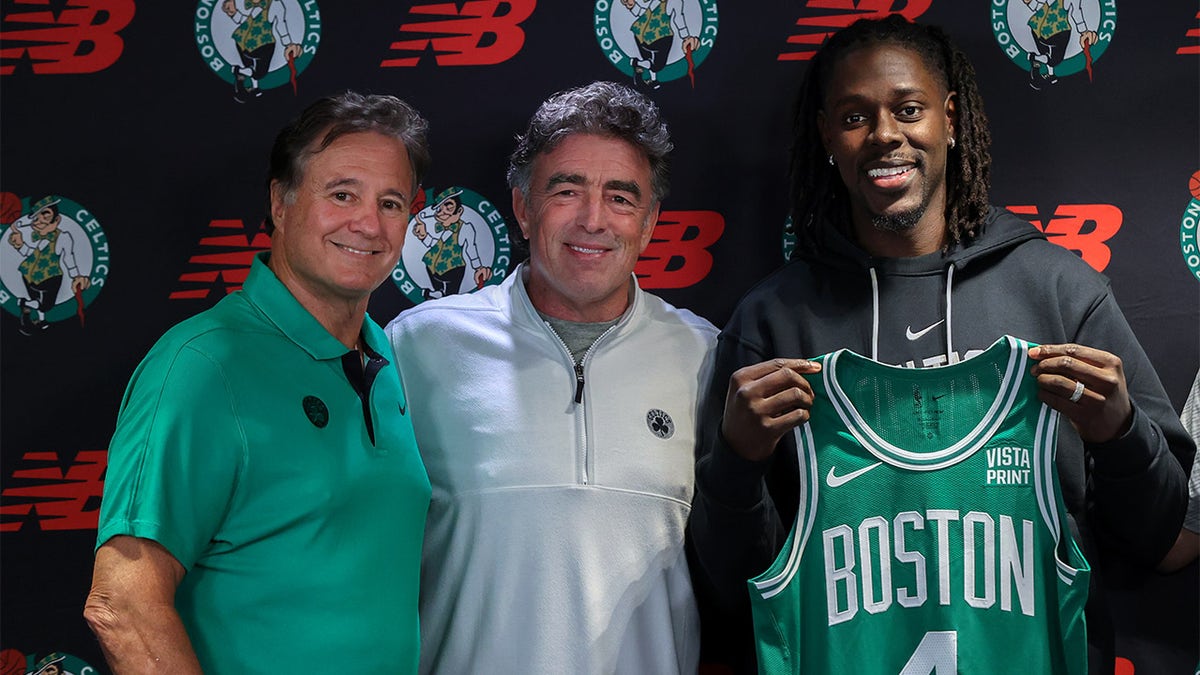 Jrue Holiday poses as a Celtic